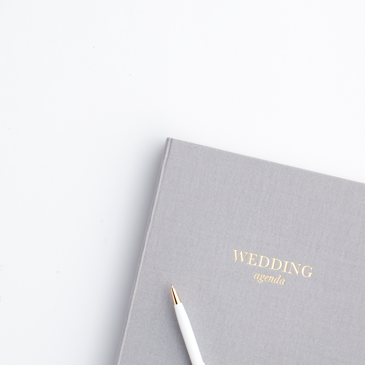 wedding agenda book and pen