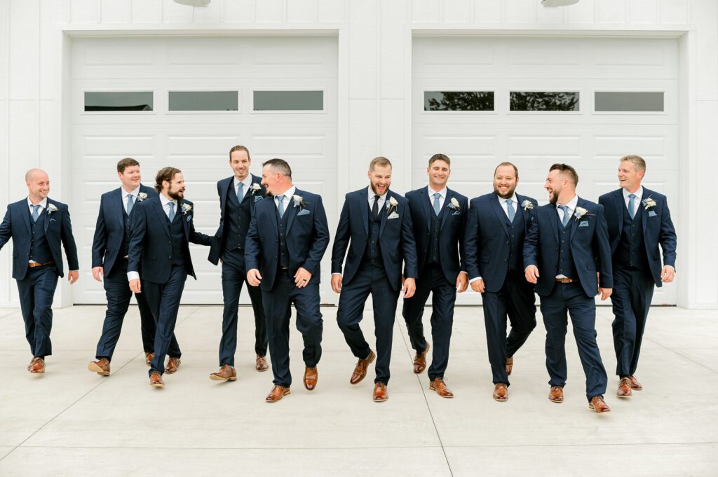 Mackenzie and Russell Wigent couple portraits by Gun Lake during their Shelbyville Michigan wedding