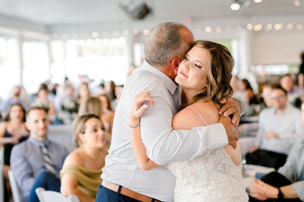 Reception at Bay Pointe Inn for Mackenzie & Russell’s Shelbyville Michigan wedding with summer décor and details