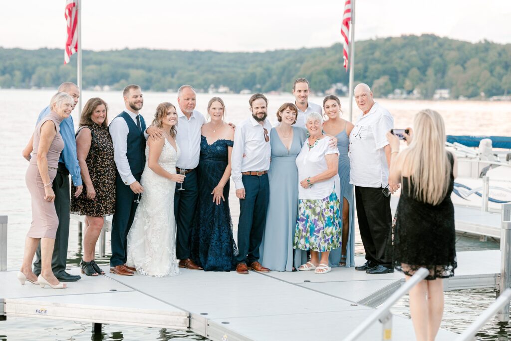 Sunset over Gun Lake during Mackenzie & Russell’s Bay Pointe Inn Shelbyville Michigan wedding
