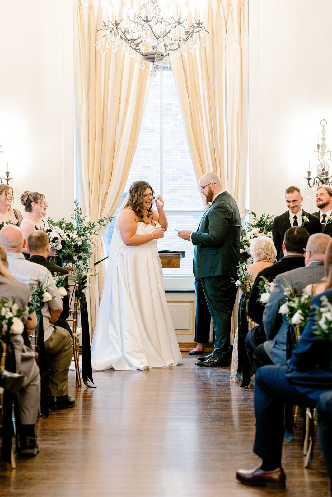 Katie and Sean sharing a quiet moment during their fall wedding at The Colony Club in Detroit