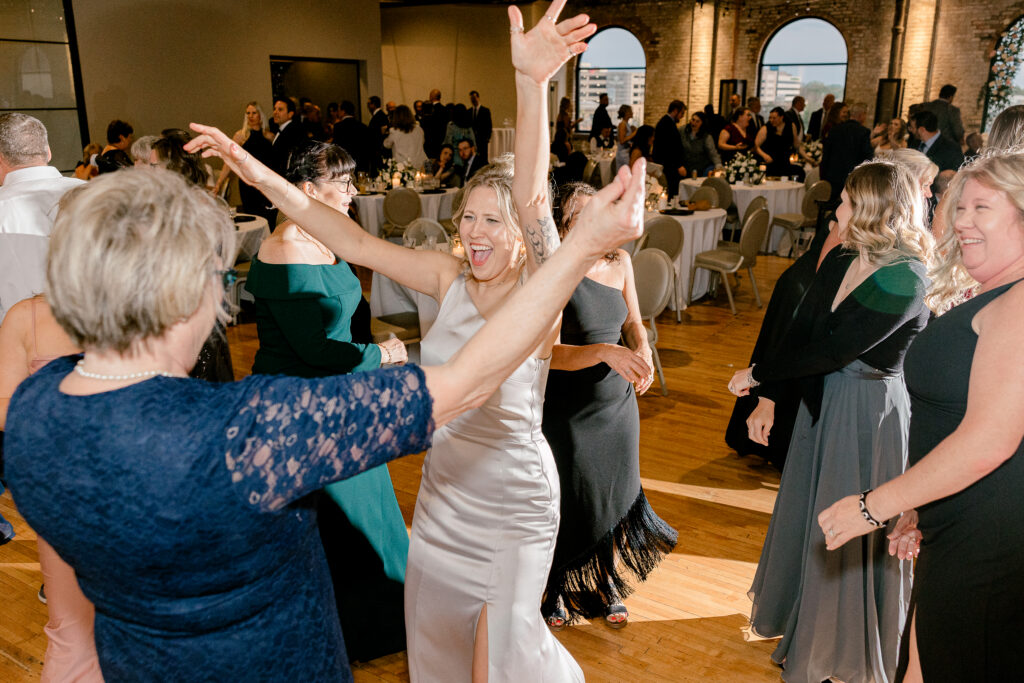 Wedding reception dancing at High Five GR Grand Rapids Michigan photographed by Kara Hanes