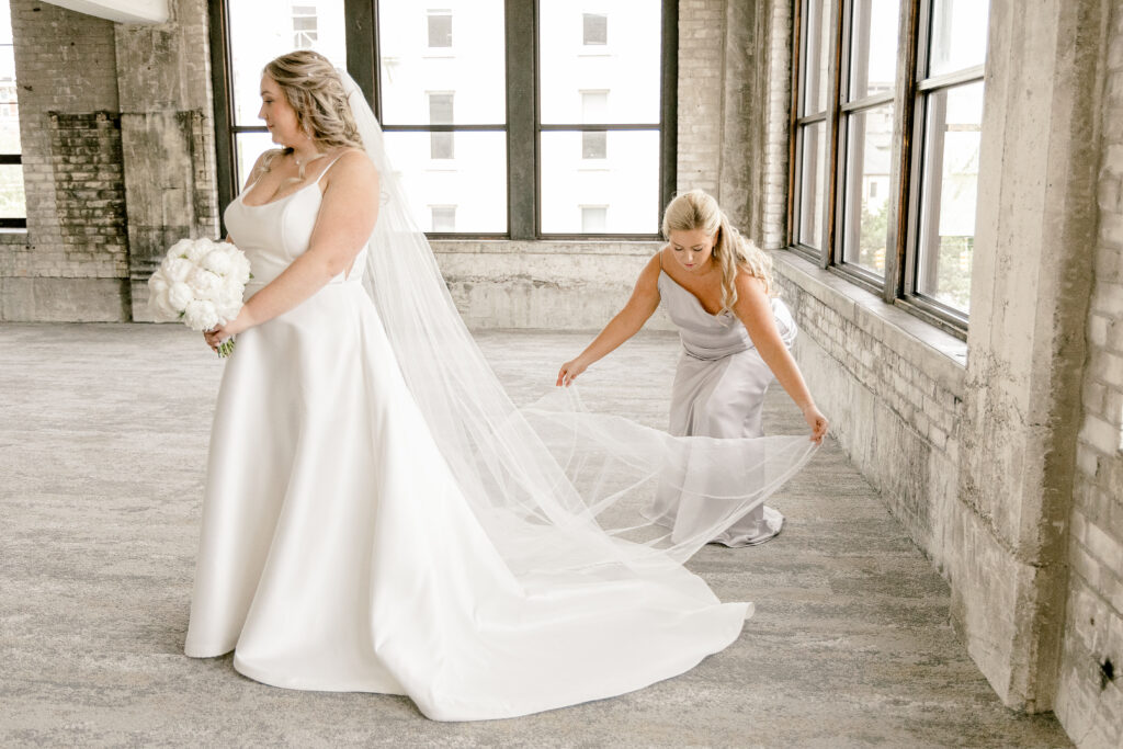 Bride getting ready at High Five GR Grand Rapids wedding photography by Kara Hanes