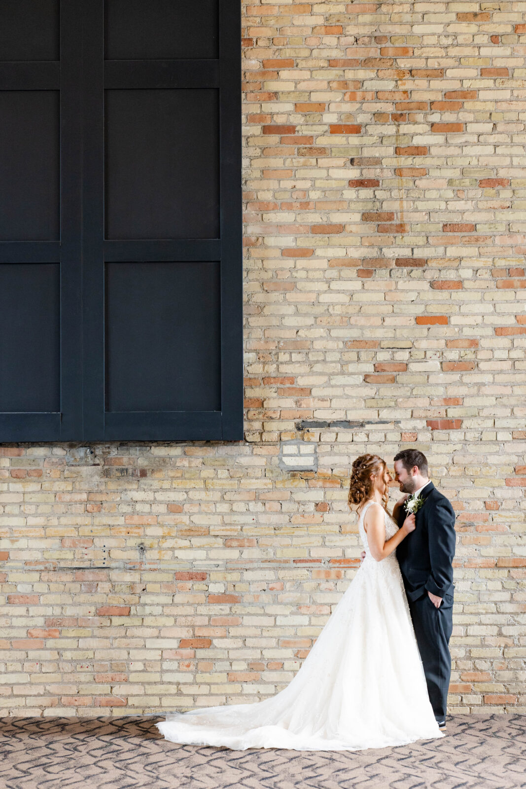 Wedding couple portraits at New Vintage Place Grand Rapids Michigan by Kara Hanes Photography