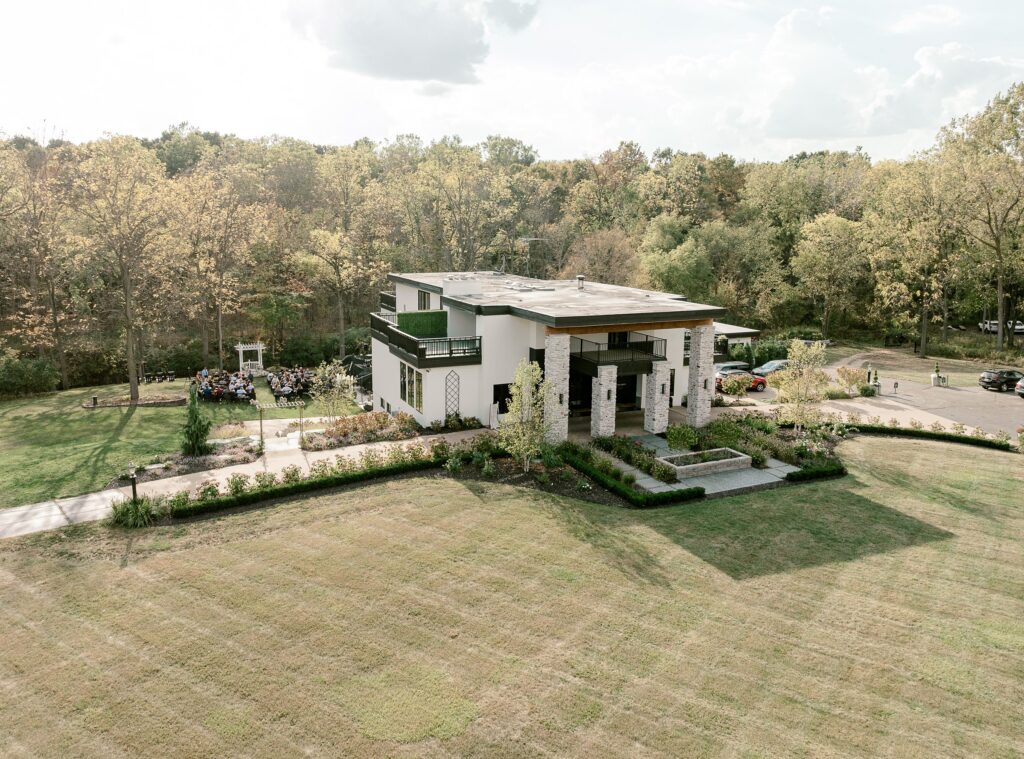 Aerial view of Hidden Grove Estate during an outdoor fall wedding ceremony near Lansing, Michigan