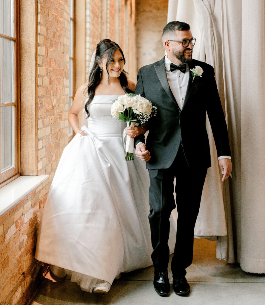 Bride with her dad before walking down the aisle