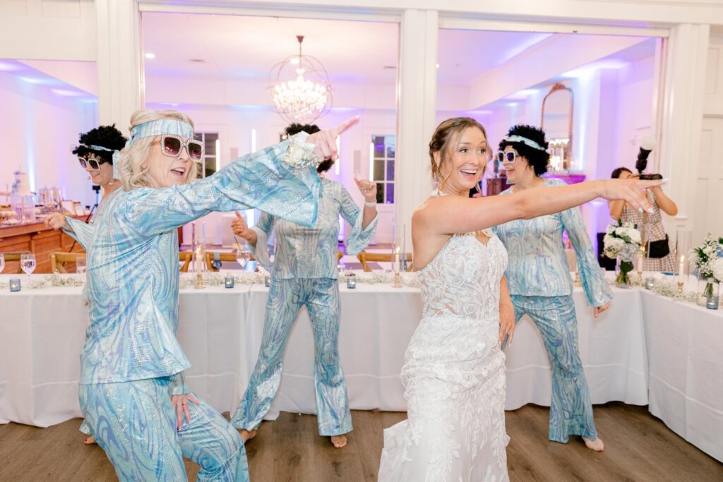 Bride joining her mom and her mom's friends during their Dancing Queen surprise dance