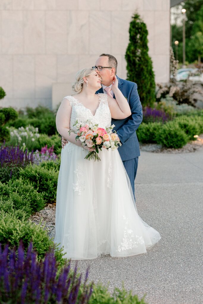 Bride and groom in the gardens at golden hour