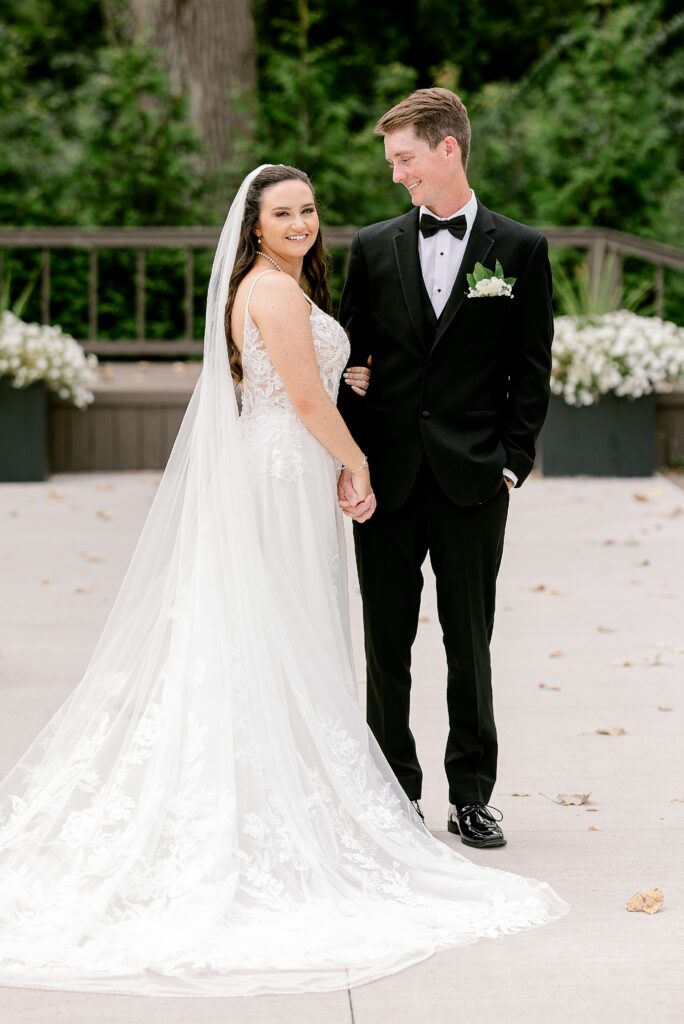 Bride and groom portrait on the patio at the Italian American Club of Livonia