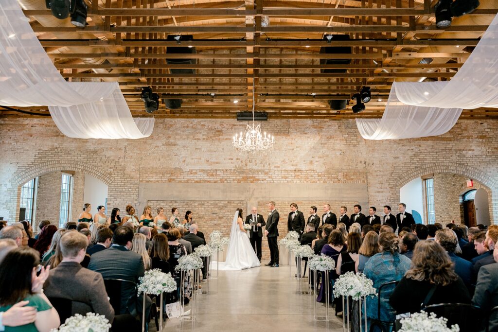 Wide view of the wedding ceremony and guests at The BRIX on Fox