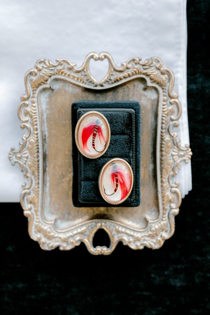 Groom's father's cufflinks on a vintage silver frame