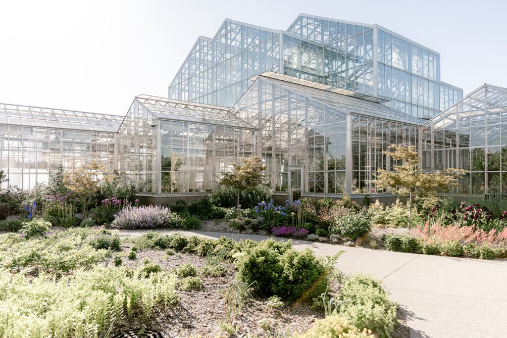 The glass conservatory at Frederik Meijer Gardens on a sunny wedding day