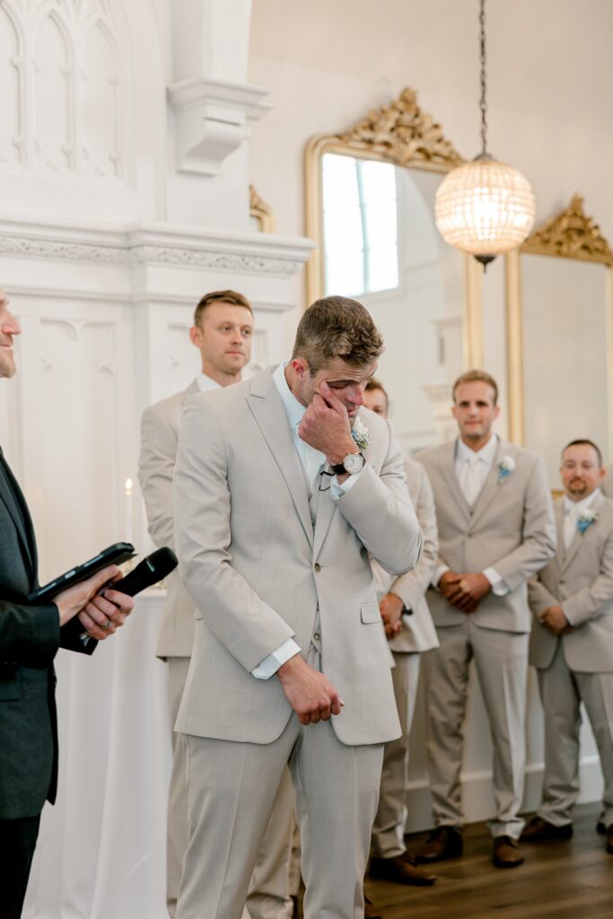 Groom and groomsmen waiting at the altar at The Broadway Avenue