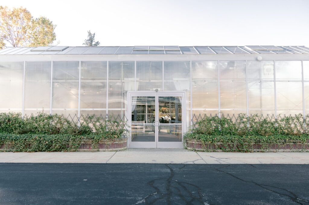 Glass doors and ivy trellis at the Ivy House greenhouse entrance