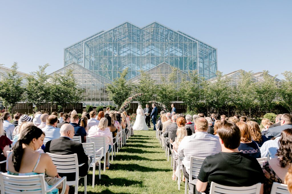 Outdoor wedding ceremony in the gardens at Frederik Meijer Gardens