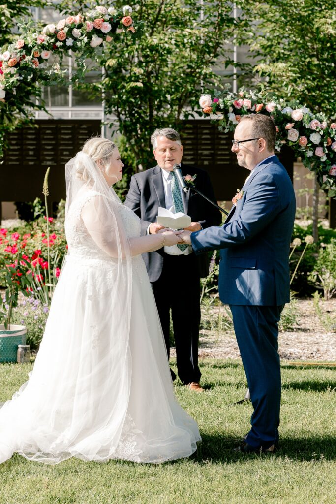 Ring exchange during the outdoor ceremony