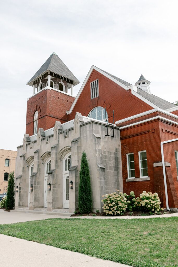 Historic red brick church exterior of The Broadway Avenue wedding venue in Grand Rapids