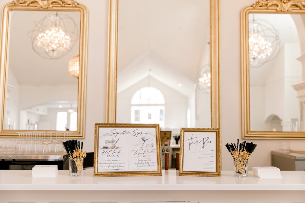 Reception details with gold mirrors at The Broadway Avenue in Grand Rapids